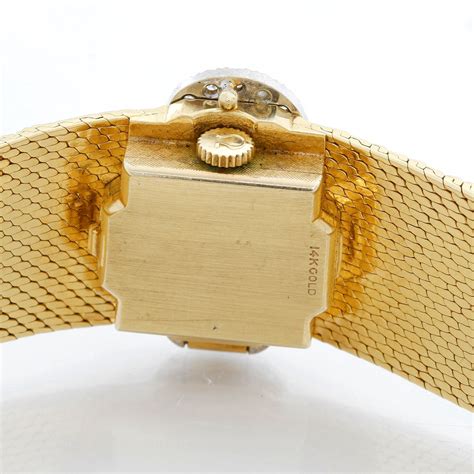 rectangular omega 14k gold watch vintage